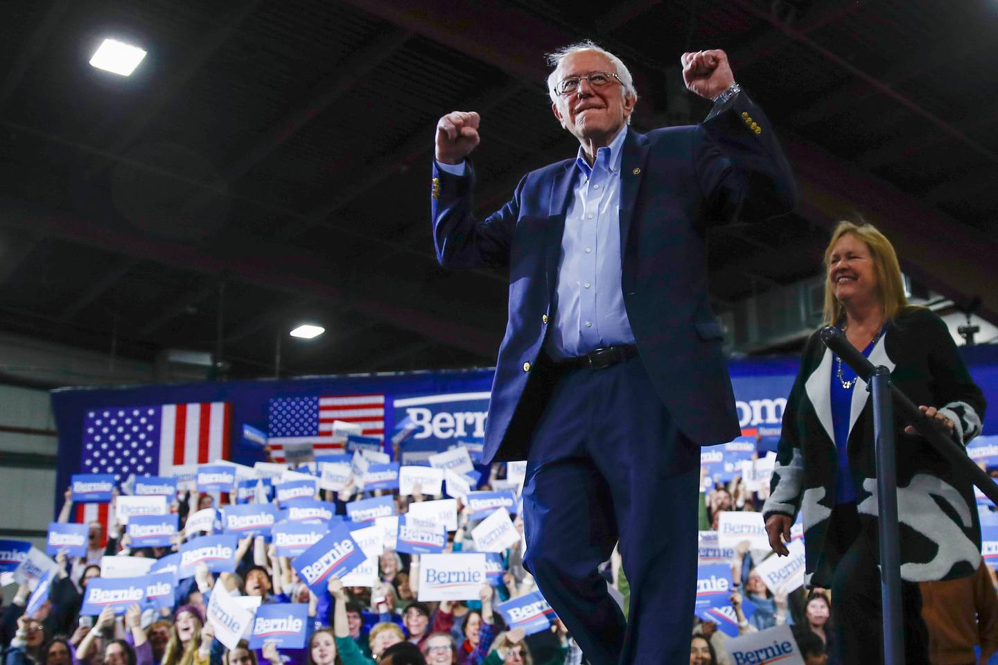Democratic presidential candidate Sen. Bernie Sanders, I-Vt., accompanied by his wife Jane O'Meara Sanders, arrives to speak during a primary night election rally in Essex Junction, Vt., Tuesday, March 3, 2020. (AP Photo/Matt Rourke)