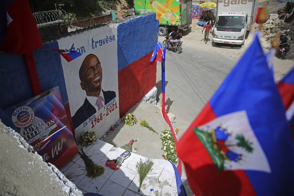 Plakat av den avdøde presidenten på Haiti.